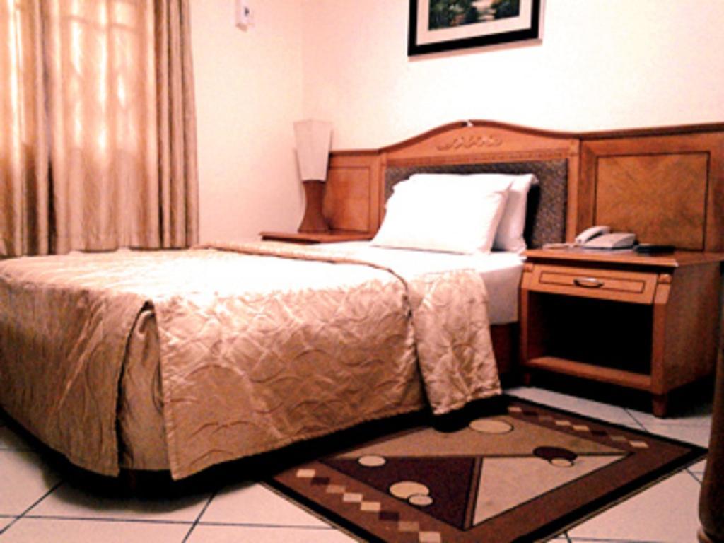 Sunset Hotel Kumasi Zimmer foto