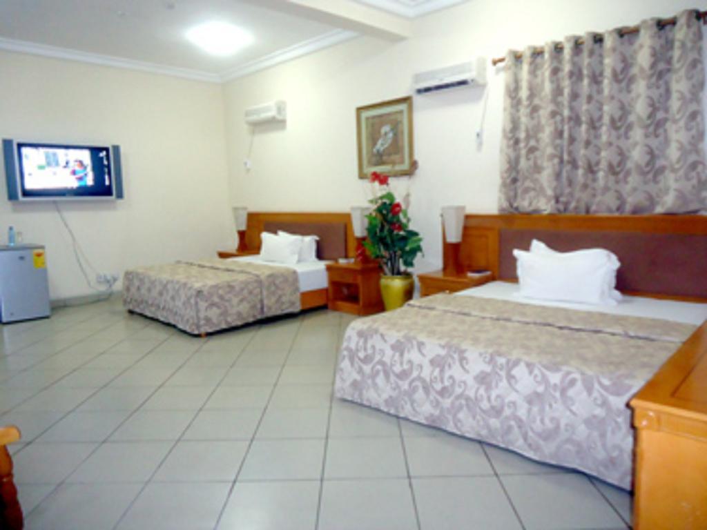 Sunset Hotel Kumasi Zimmer foto